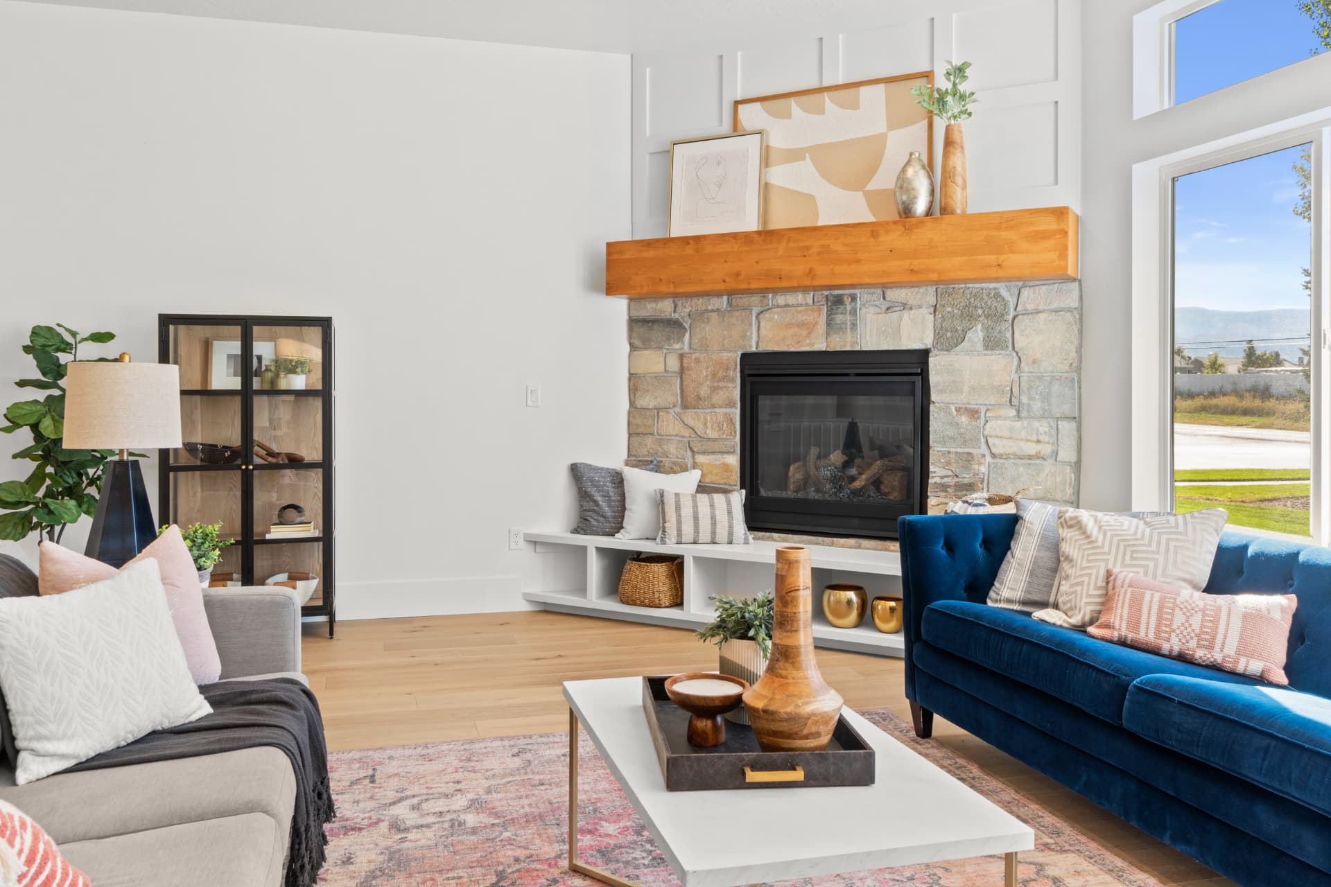 Stone fireplace & vaulted great room — Interiors photography by Dane Oliver